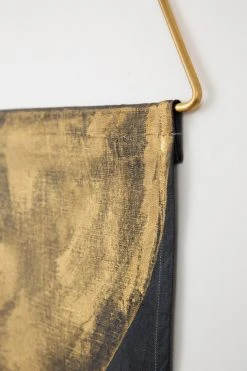 Conejo & Co Home Goods Mono Wall Hanging - Gold